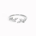 Marquise gemstones arranged in a laurel-inspired pattern on an open silver ring