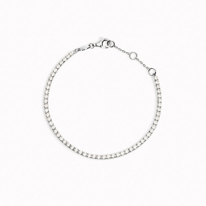 Cubic Zirconia tennis bracelet with white stones in sterling silver on white background
