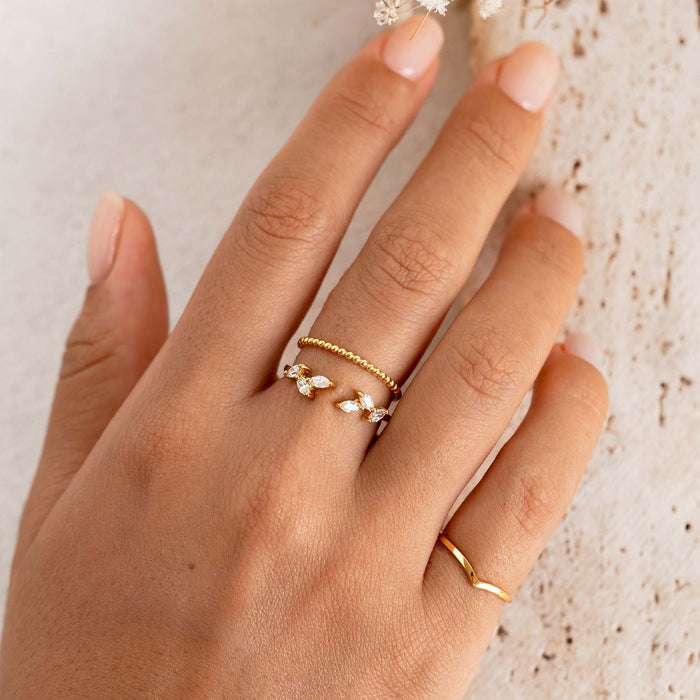 Gold V Ring on model with stacker rings