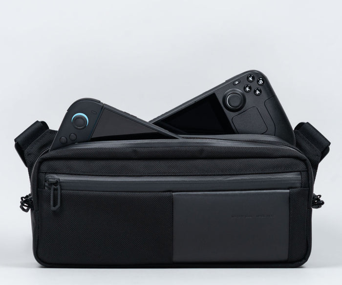 Designed to carry two gaming handhelds