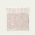 Beige textured rug on a light gray background, #dunegray