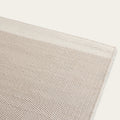 Close-up of a Dune gray wool rug showing the texture and weave. #dunegray